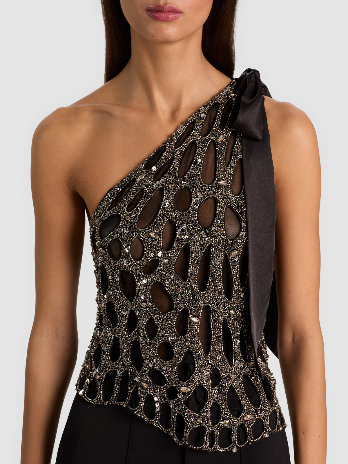 TOP ASIMMETRICO YESENIA EMBELL CUTOUT - NERO/CANNA DI FUCILE