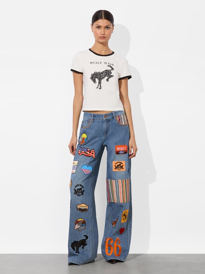 A+O X BRONCO ONIE BABY TEE - BUILT WILD image 1 - Alice And Olivia