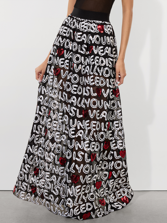 A+o X The Beatles Capsule Collection | Alice + Olivia A+o X The Beatles Capsule Collection | Alice + Olivia