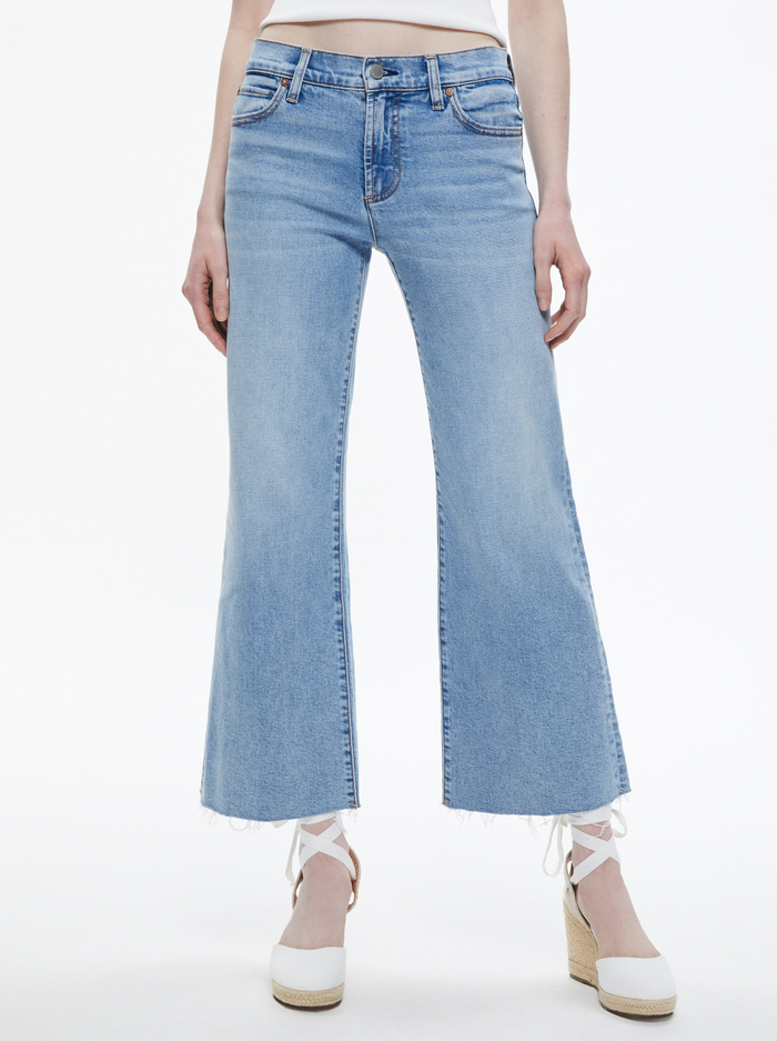 ROXIE LOW RISE FLARED LEG JEAN - MADDY BLUE - Alice And Olivia