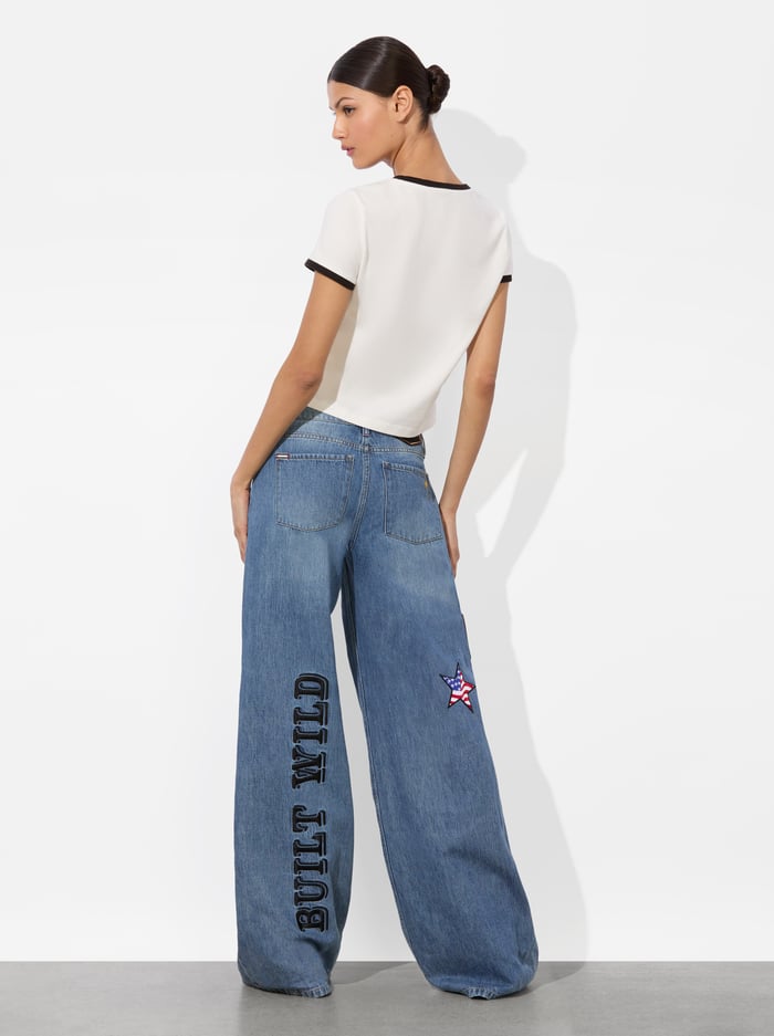 A+O X BRONCO ONIE BABY TEE - BUILT WILD image 2 - Alice And Olivia