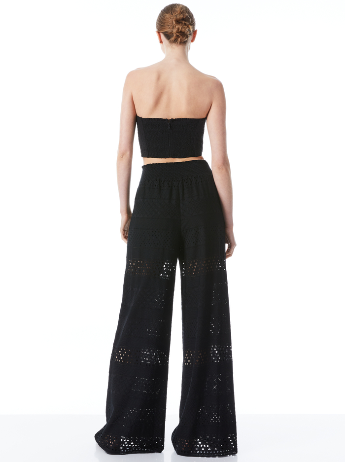 RUSSELL HIGH WAISTED EYELET PANT - BLACK image 1 - Alice And Olivia