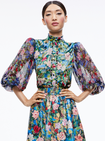 EARLA VEGAN LEATHER FLARE SKIRT + ILAN SMOCKED SLEEVE BUTTON FRONT BLOUSE